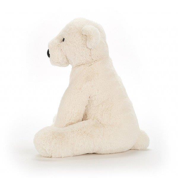 Jellycat Perry Polar Bear sitting sideway. A super cuddly soft toy for children.
